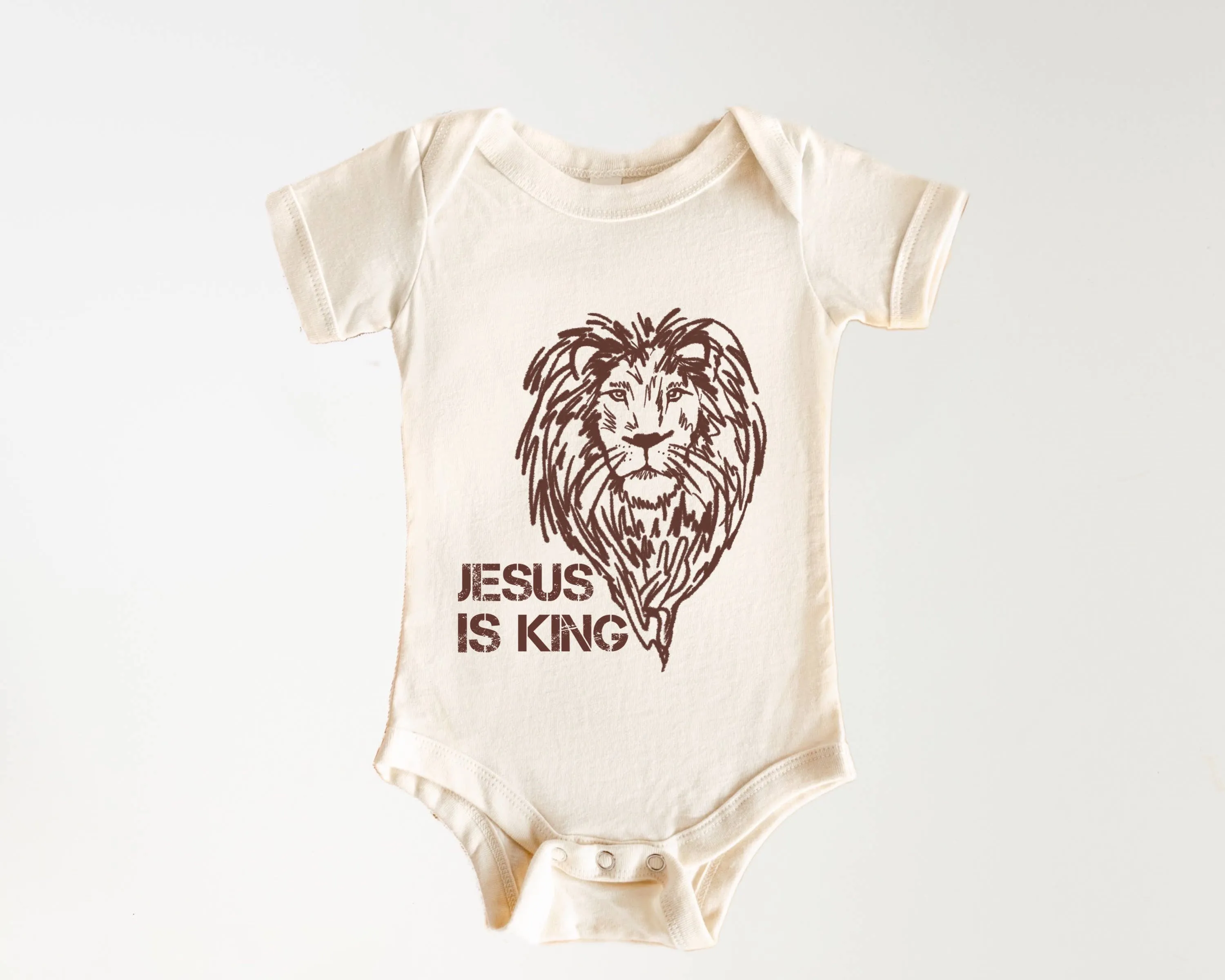 Organic Jesus Is King Bodysuit: Cream   Brown